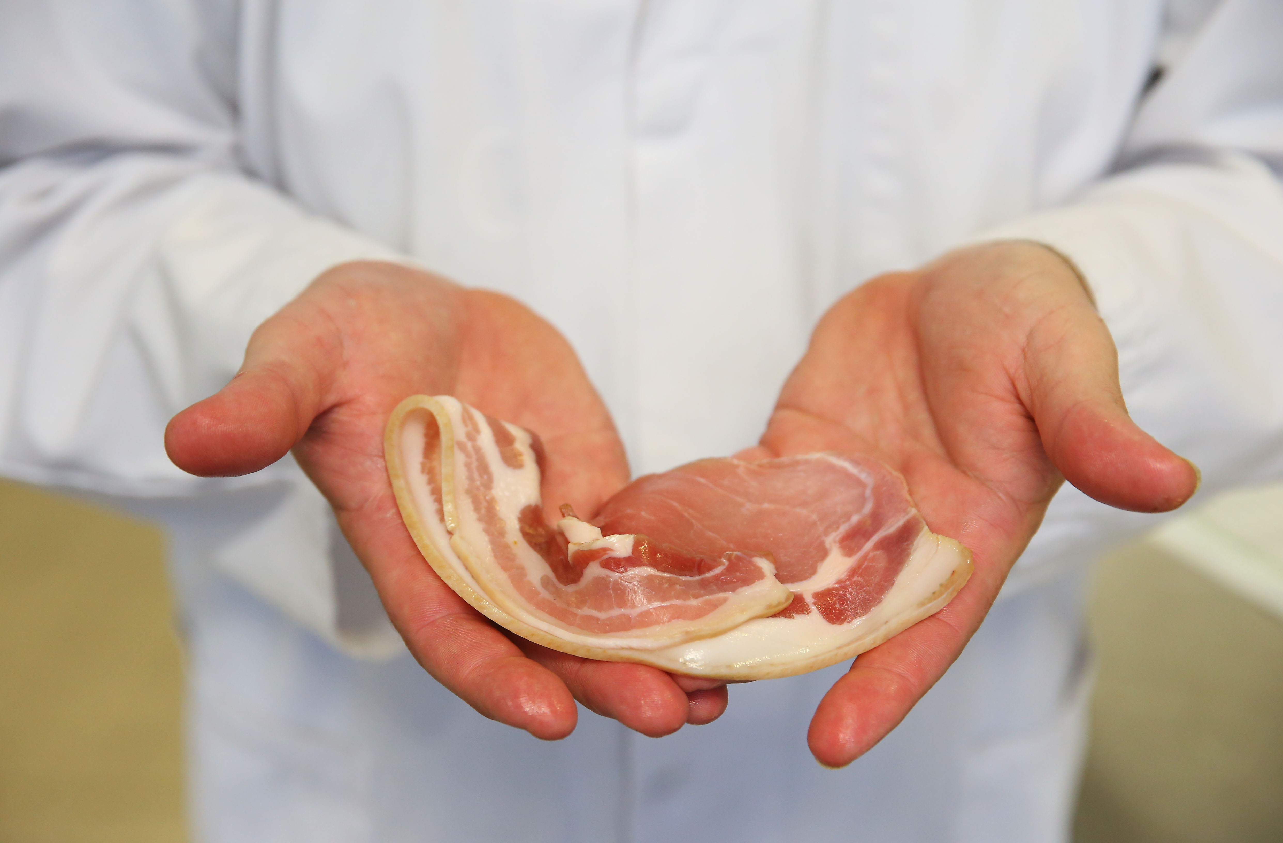 Aussie bacon in hands