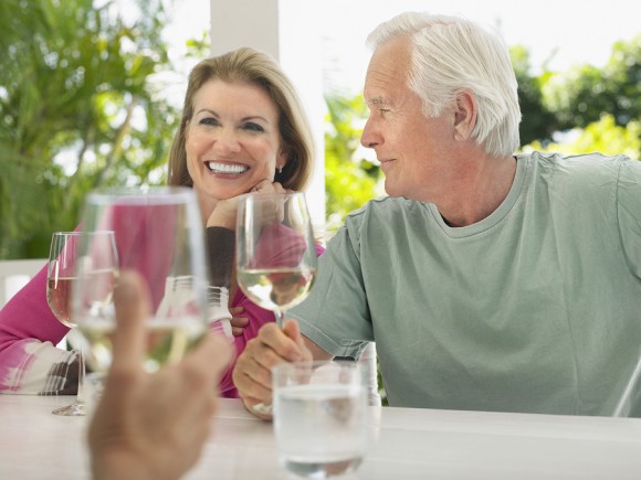 Baby boomers drinking wine and having a good time