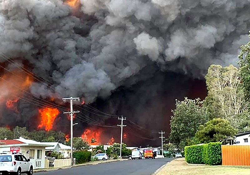 Bushfires threaten the township of Harrington in November 2019