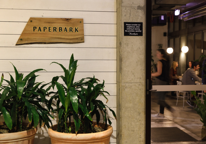 Restaurant entrance with sign reading Paperbark